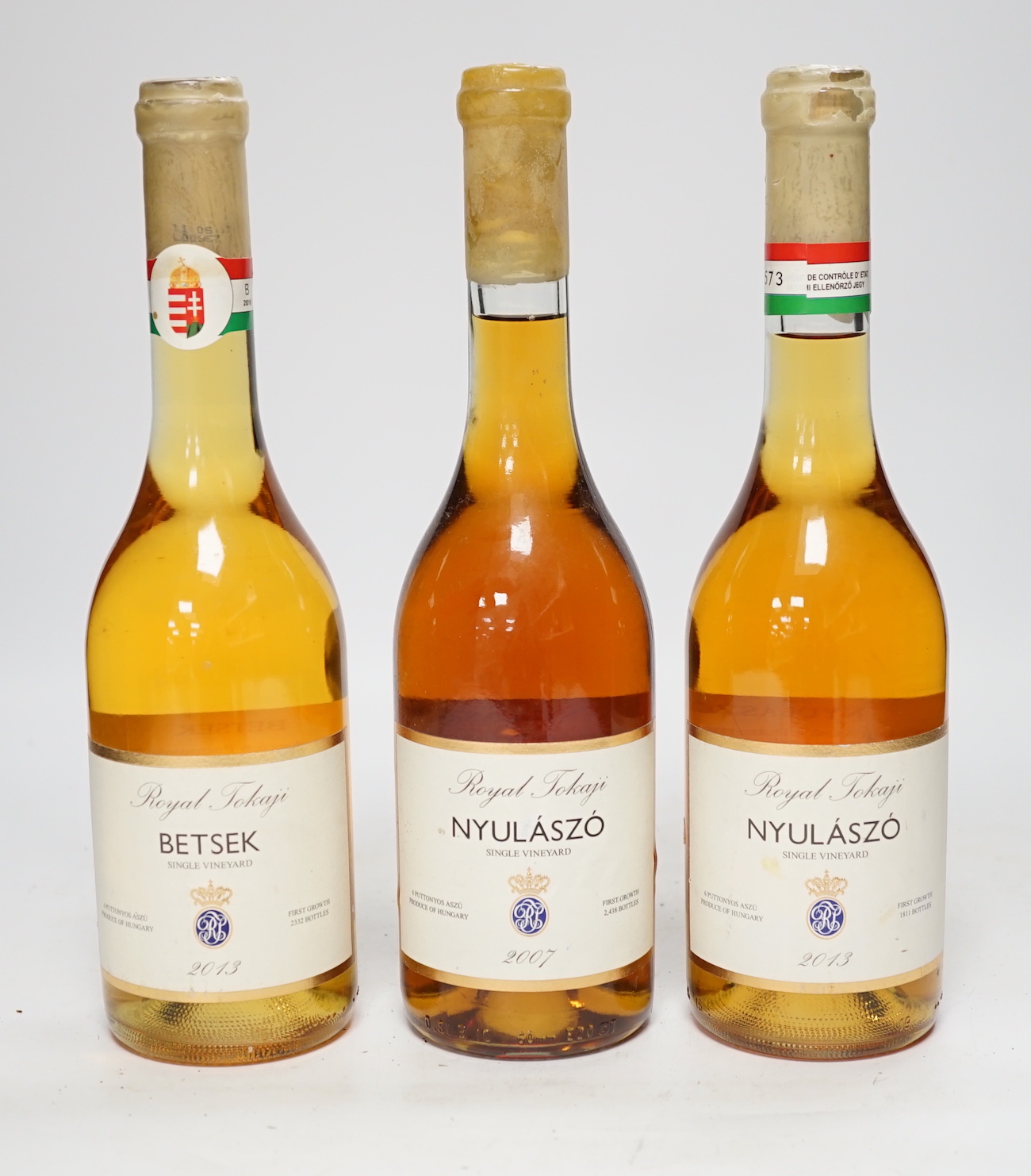 Three bottles of Royal Tokaji singke vineyard 6 puttonyos, each 50cl, Betsek 2013 and Nyulaszo 2007 & 2013.